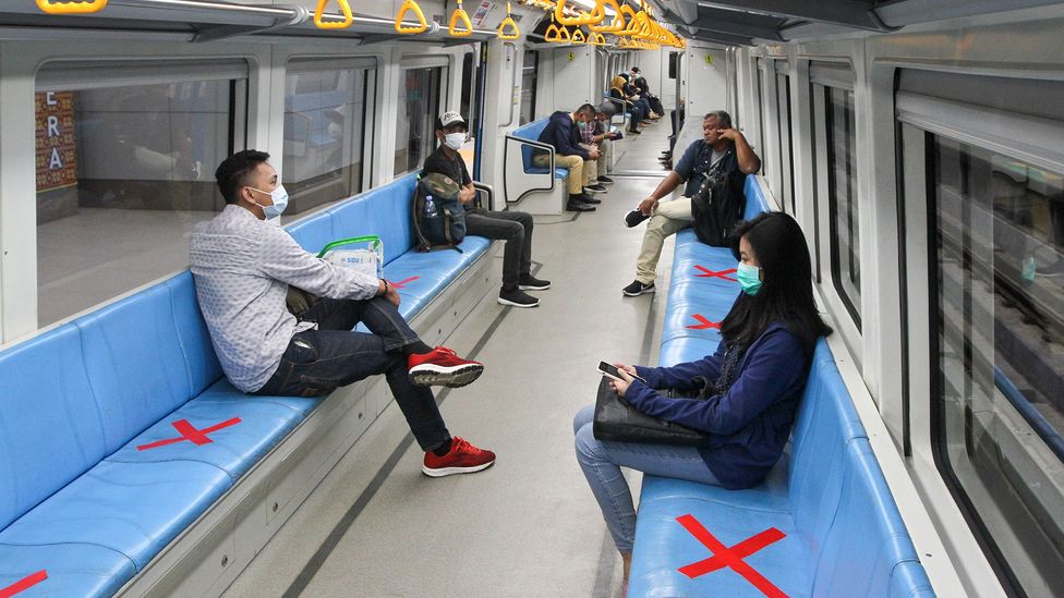 In Palembang, South Sumatra, seats on trains have been marked with red crosses to show people how to keep their distance (Credit: Getty Images)