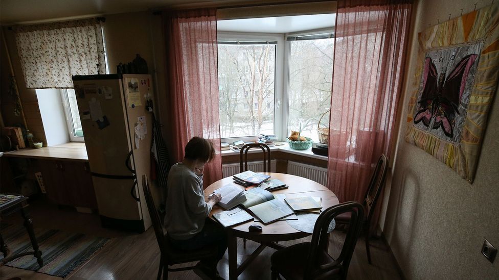Veronika Makarova reads fairy tales to children on the phone, working from her apartment during the Covid-19 pandemic (Credit: Getty Images) Veronika Makarova reads fairy tales to children on the phone, working from her apartment during the Covid-19 pandemic (Credit: Getty Images)