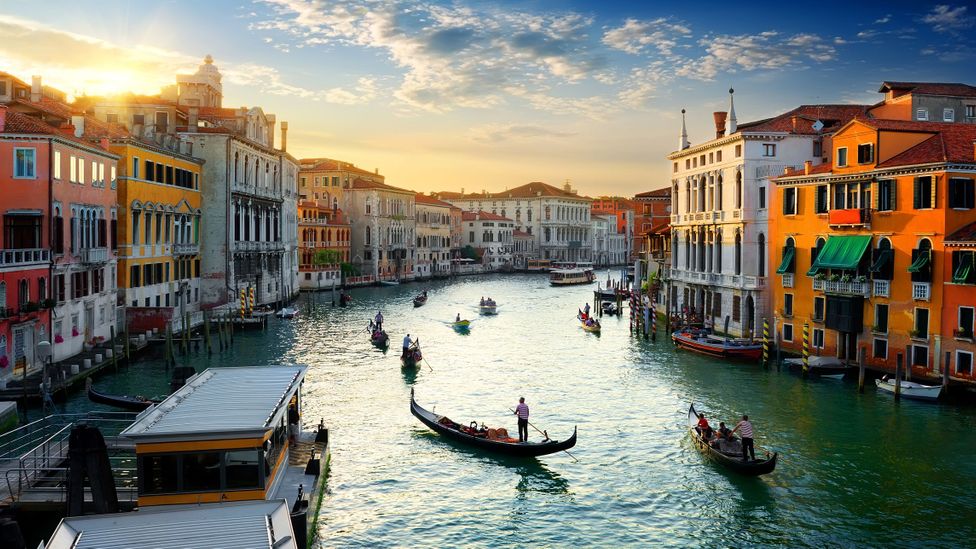 Waterways in Venice currently appear cleaner because of a drastic reduction in tourist boat traffic (Credit: Givaga/Getty Images)