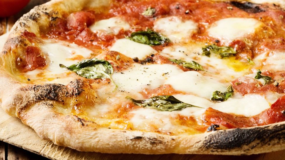 Margherita pizza was invented in 1889 in honour of Queen Margherita di Savoia's visit to Naples (Credit: Vima/Getty Images)