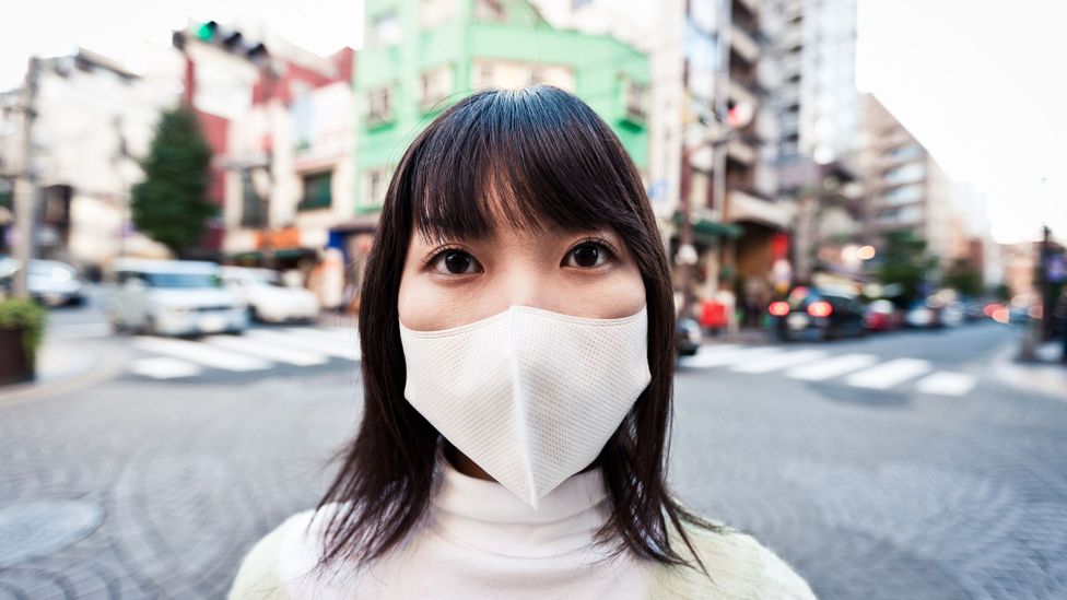 Japan’s health-conscious culture means that many people are already used to wearing masks (Credit: Mlenny/Getty Images)