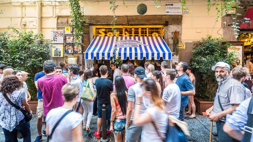 Locals and tourists typically line up at Gino e Toto Sorbillo along Naples' Via dei Tribunali (Credit: imageBROKER/Alamy)