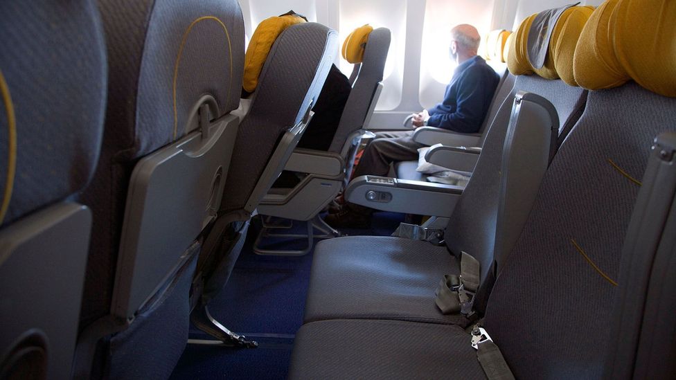 Some airlines are looking to keep middle seats open for social distancing, but the proper distance requires many more empty seats (Credit: Alamy)