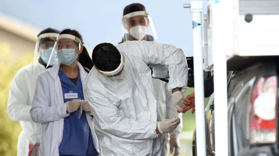 A medical professional administers a Covid-19 test in Bolinas, California on 20 April 2020; the town is attempting to test each of its 1,600 residents (Credit: Getty Images)