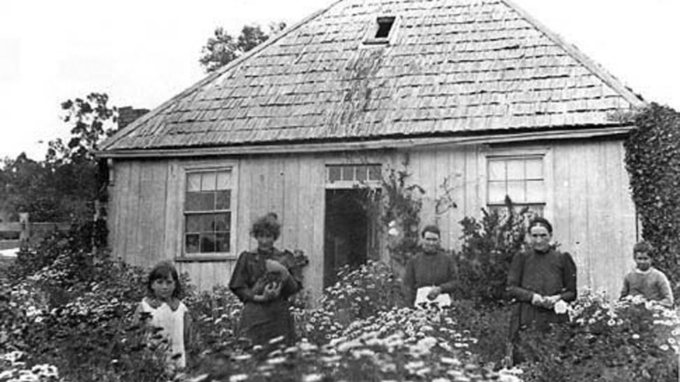 Despite the site's poor soil, Shelwood Cottage was well tended and surrounded by flowers, as this photo from circa 1902 shows