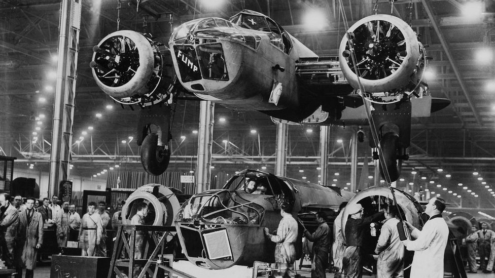 During World War Two, factories which had once made cars were quickly reorganised to make weapons such as these British bombers (Credit: Getty Images) During World War Two, factories which had once made cars were quickly reorganised to make weapons such as these British bombers (Credit: Getty Images)
