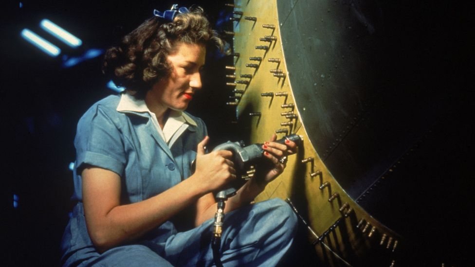 Woman rivetting aircraft (Credit: Getty Images)