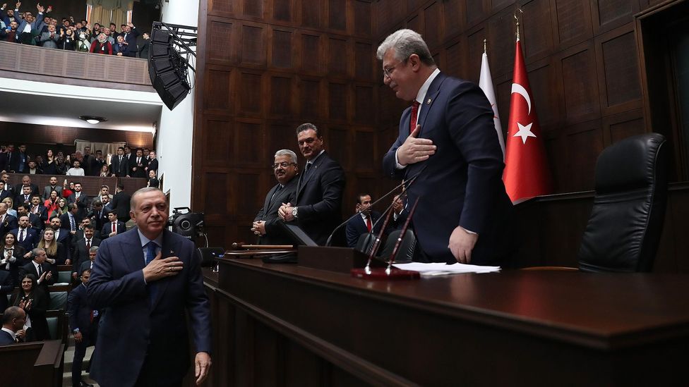Since the pandemic, many Turks have revived the centuries-old eyvallah greeting, where one puts a hand over their heart and bows slightly (Credit: Anadolu Agency/Getty Images)