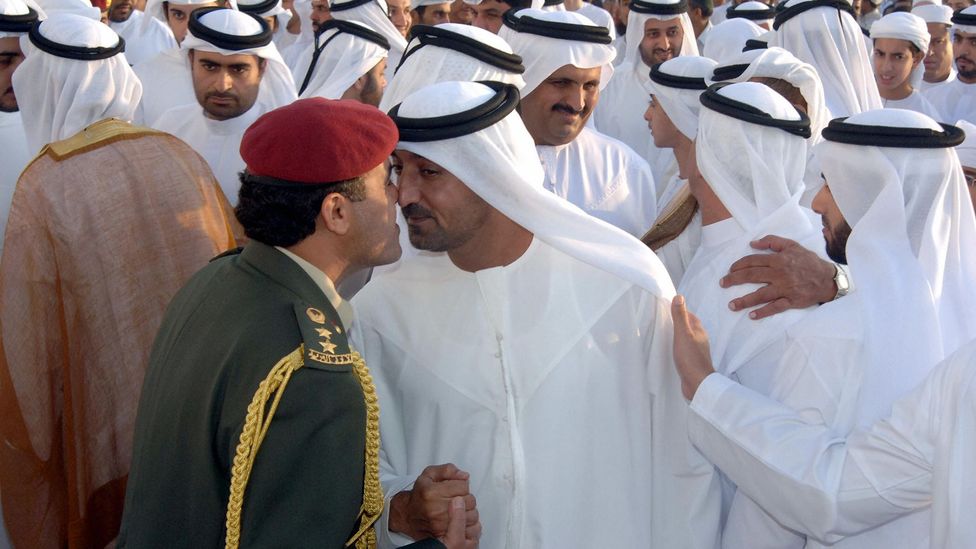 Like the hongi, handshakes and hugs, traditional Emirati nose kisses have stopped in the age of social distancing (Credit: Haider Shah/Getty Images)