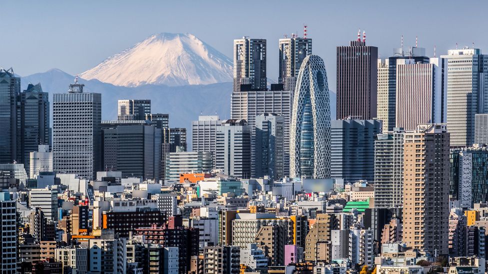 Japan’s approach to work has changed in recent years, with co-working spaces now flourishing in Tokyo (Credit: Torsakarin/Getty Images)
