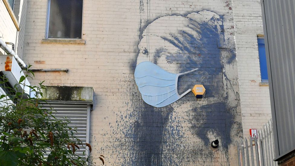 A parody of Girl with a Pearl Earring by Johannes Vermeer, Banksy’s Girl with a Pierced Eardrum has recently been updated with a mask (Credit: PA)