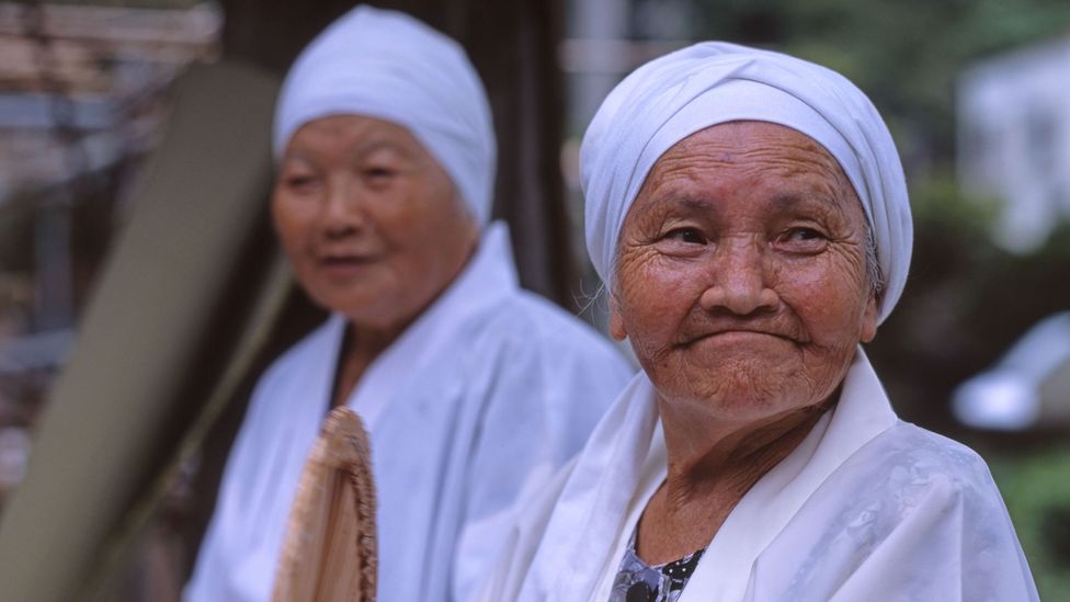 Social interaction and spirituality were both found to be common among 100 year olds in places like Okinawa (Credit: Alamy)