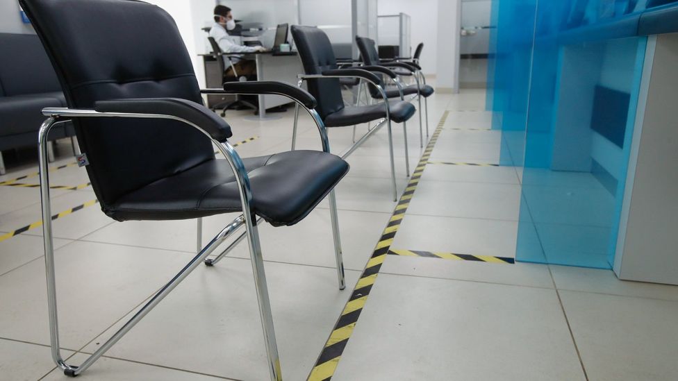 Chairs spaced by tape in a bank in Moscow, Russia on 8 April 2020