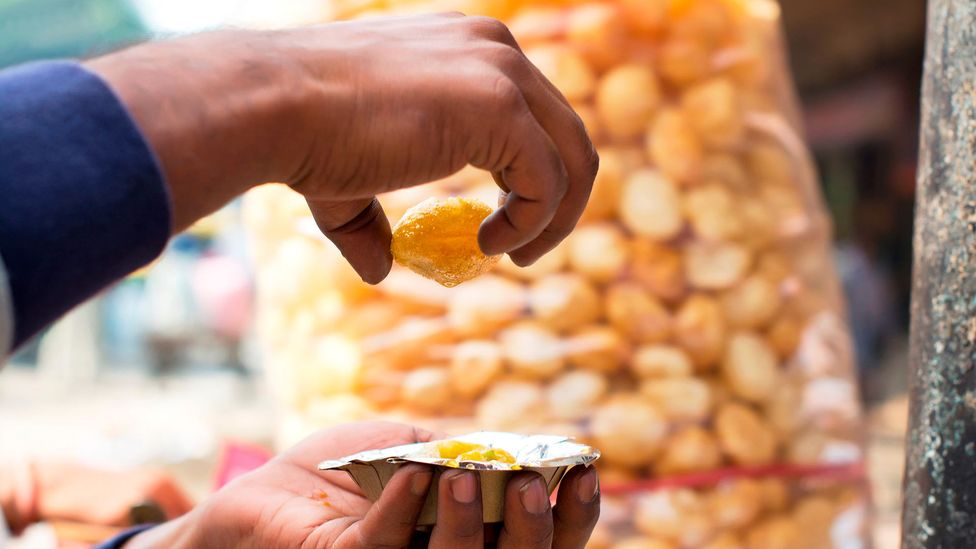 Pani puri is one of the street snacks that many Indians have missed the most during lockdown (Credit: IndiaPictures/Getty Images)