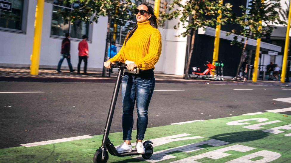 Electric scooters are loved by some, abhorred by others - and they are not quite as green as their image (Credit: Getty Images)