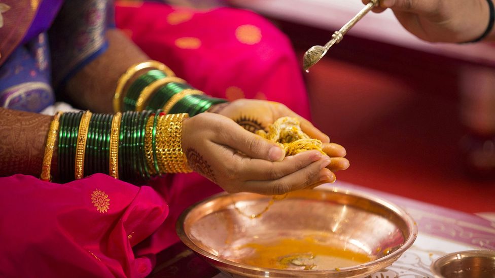 In Hindu communities, turmeric is used in festive occasions like weddings as a marker of fertility and prosperity (Credit: Credit: ePhotocorp/Getty Images)