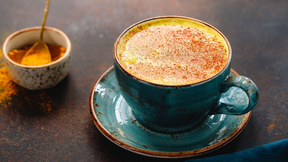 Indian haldi doodh is warm milk mixed with turmeric powder and sweetened with sugar (Credit: Edalin/Alamy)