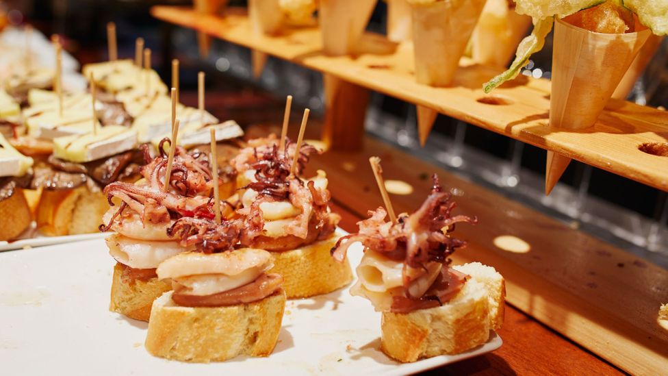 Pintxos bars in San Sebastian and Bilbao serve up flame-kissed bites using local ingredients (Credit: Encrier/Getty Images)