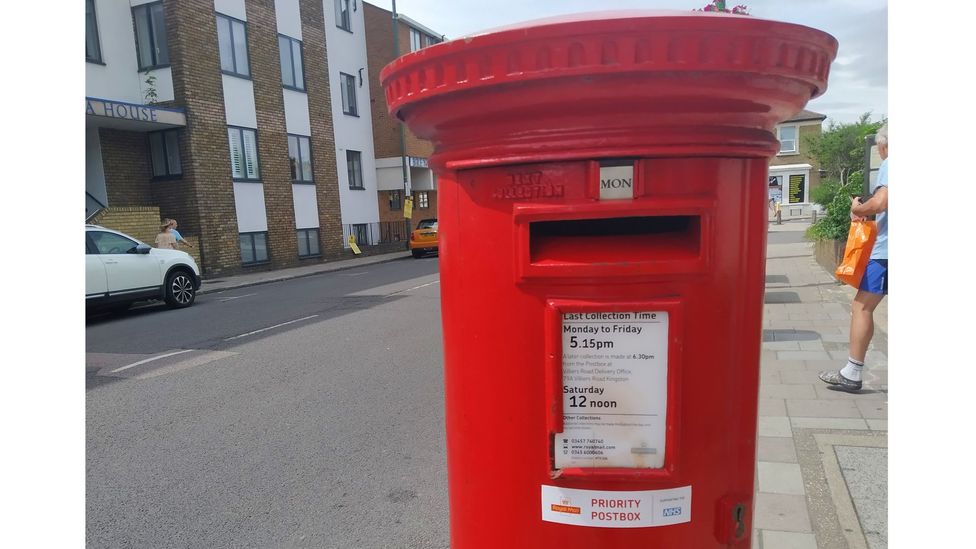 Once a week, I swab my tonsils and nose before posting the sample in a Royal Mail "priority postbox" (Credit: Richard Fisher)