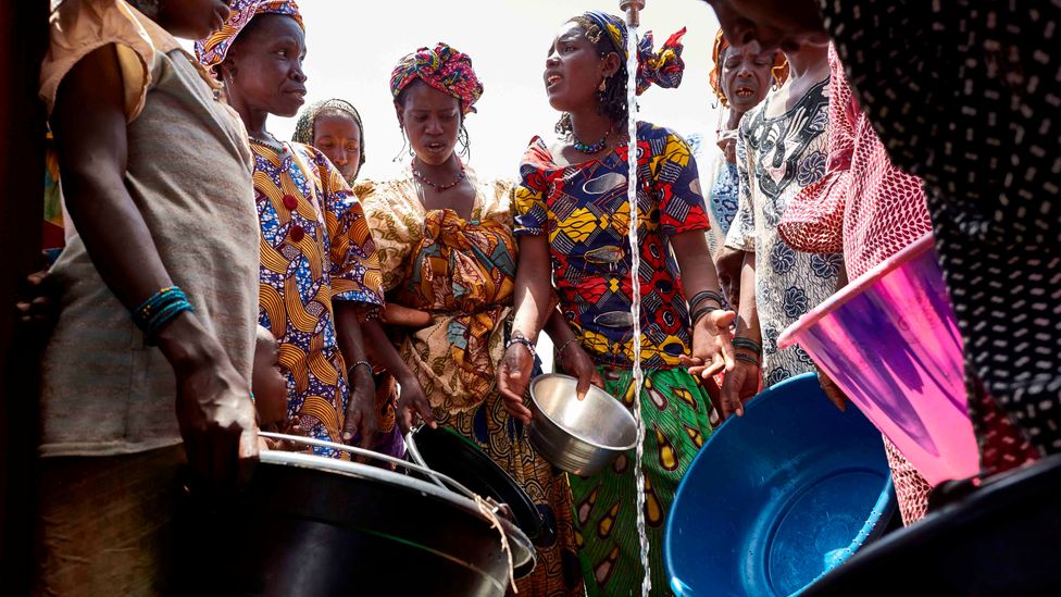 In Malian culture, girls and women are responsible for bringing water, so inaccessible pumps and drought disproportionately affect them (Credit: Getty)