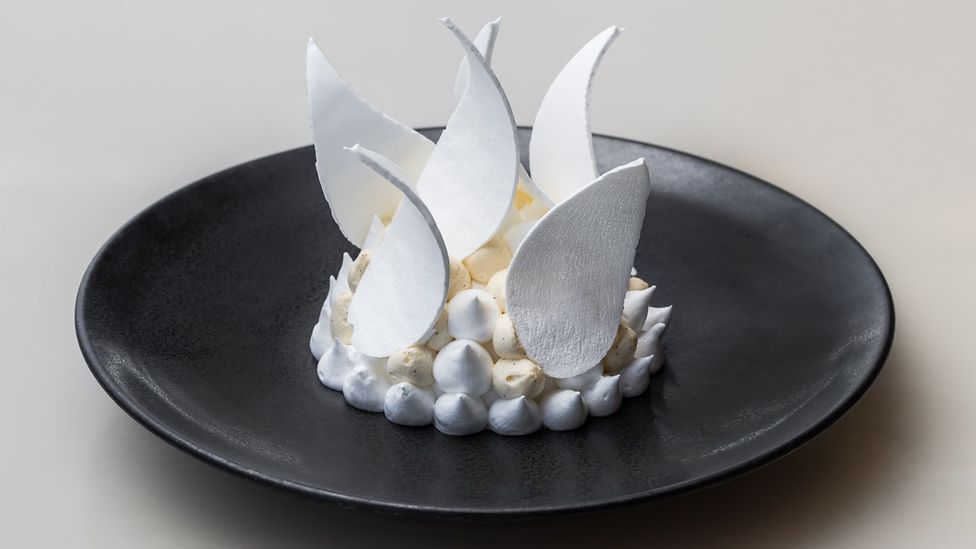 Peter Gilmore’s pavlova in the shape of the Sydney Opera House is served at Bennelong Restaurant (Credit: Nikki To)