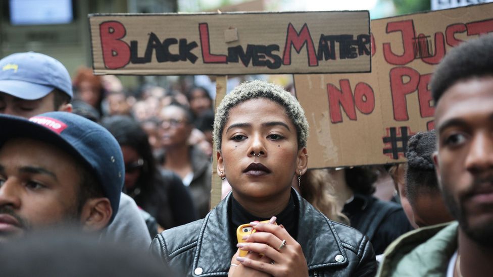 Many talk of the heavy burden of receiving a constant stream of negative messages and images associated with being black (Credit: Alamy)