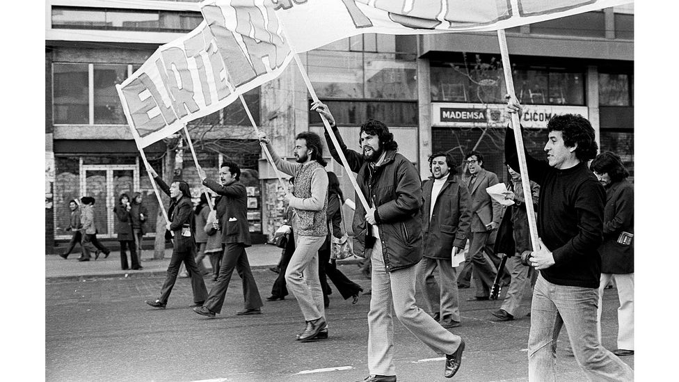 Jara (pictured right) wrote the song Venceremos, a Chilean socialist anthem that means 'We Will Win' (Credit: Getty Images)