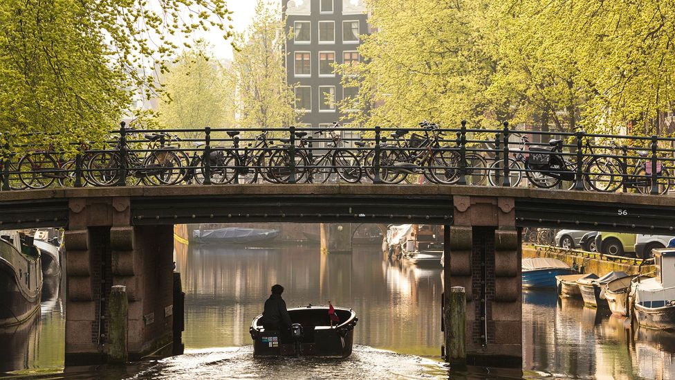 Amsterdam's canals have long been a big draw for tourists (Credit: Peter Adams/Getty Images)