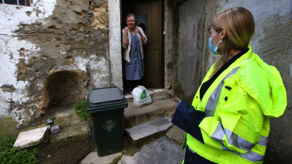 While our interactions with strangers might have been less serendipitous since the pandemic began, there has also been a "carnival of compassion" among communities (Credit: Alamy)