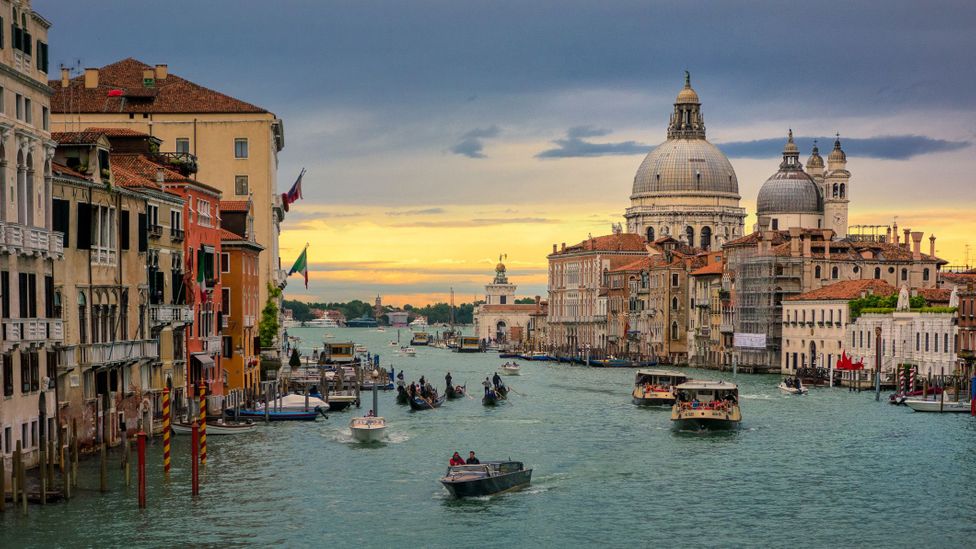 Historic Venice has fewer than 60,000 residents yet receives up to 30 million tourists each year (Credit: Theirry Hennet/Getty Images)