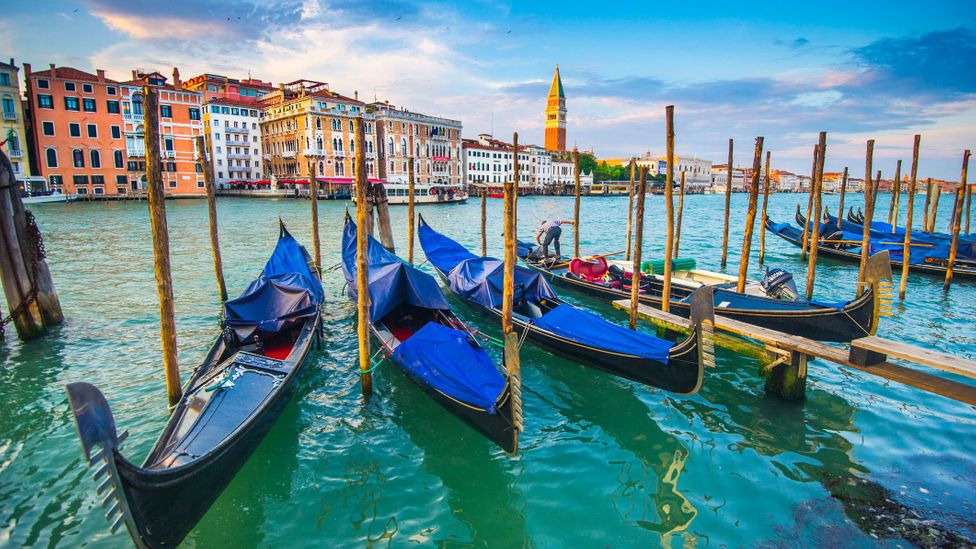 Venice is made up of 118 small islands connected by numerous canals and bridges (Credit: Marco Bottigelli/Getty Images)