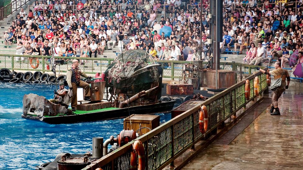 The Waterworld film attraction, such as this one in Singapore, has been one of the most popular at the Universal Studios theme parks (Credit: Alamy)