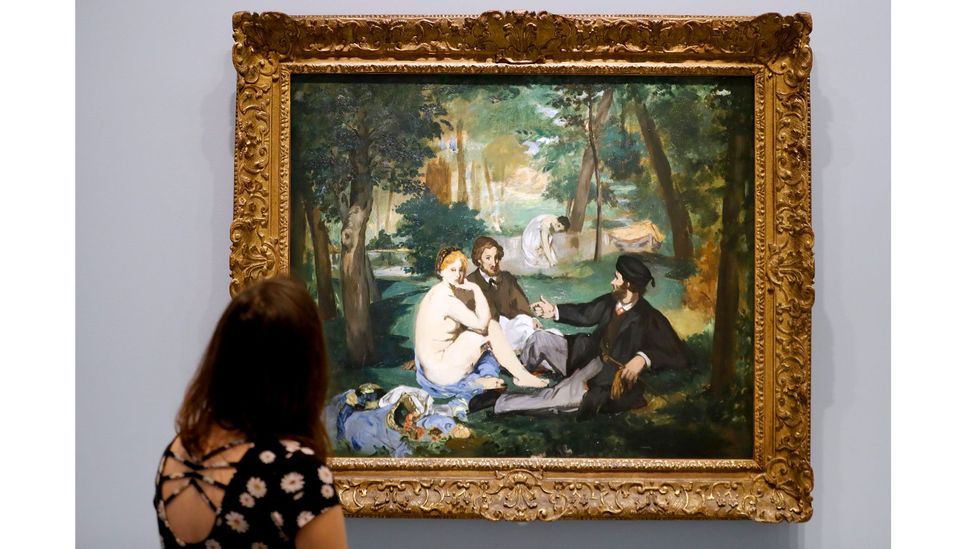 Another of ArtActivistBarbie's subjects is Manet's Le Dejeuner sur l'Herbe, where a female nude is accompanied by two fully-clothed men (Credit: Getty Images)