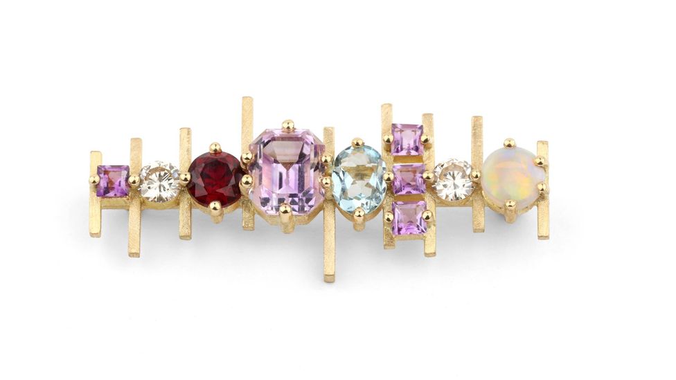 The Lifeline brooch by Shimell and Madden was created by re-setting gemstones from the client's existing jewellery collection (Credit: Goldsmiths' Fair)