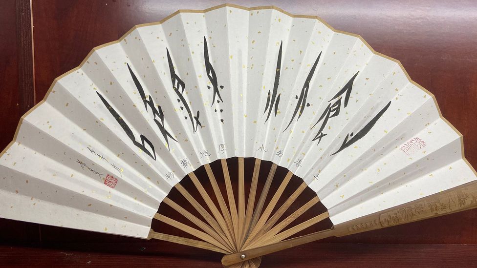 Coded Nüshu messages among women were embroidered on fans, scarves and cotton belts (Credit: Xin Hu)