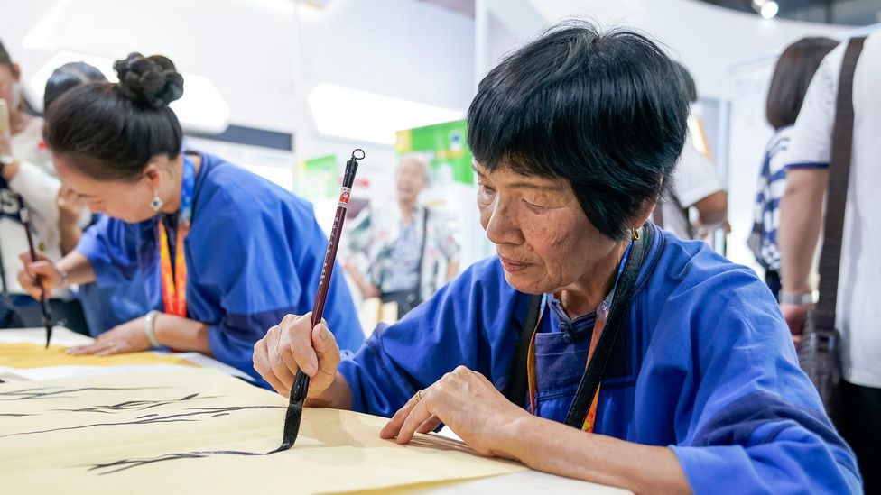 In recent years, Nüshu has seen something of a resurgence thanks to classes taught by the museum's inheritors (Credit: Xinhua/Alamy) In recent years, Nüshu has seen something of a resurgence thanks to classes taught by the museum's inheritors (Credit: Xinhua/Alamy)