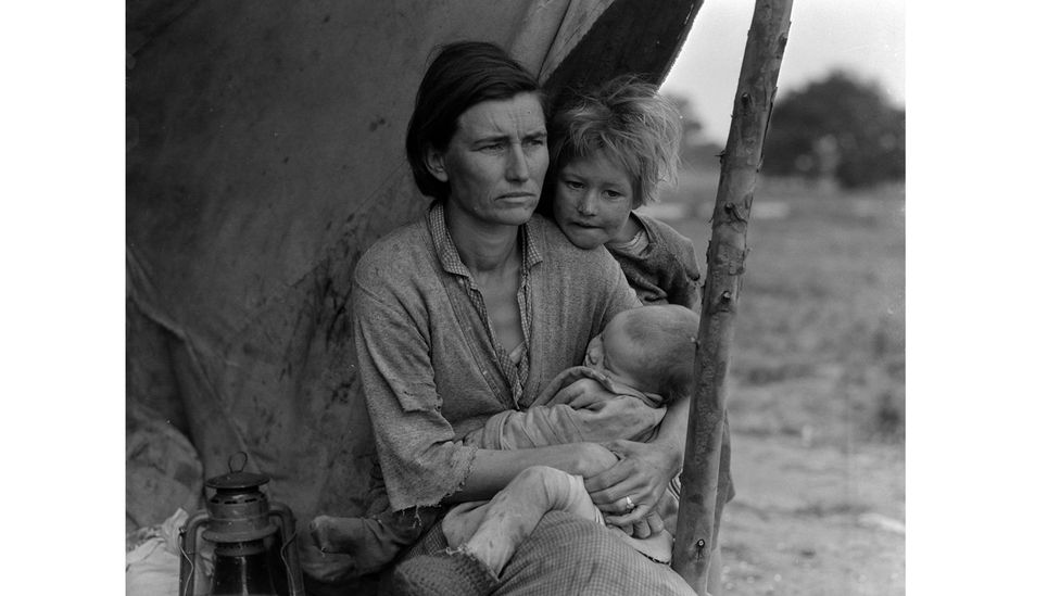 Guthrie was outraged by the plight of economic migrants who were known as 'Okies' - captured by the photographer Dorothea Lange (Credit: Getty Images)