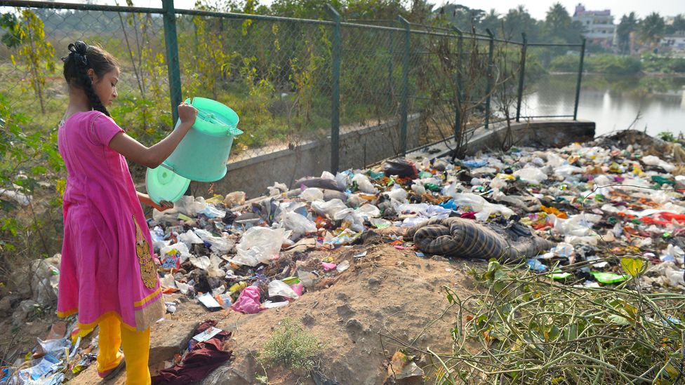 Problems with waste dumping and pollution at surface lakes cause a problem for finding drinking water in Bangalore (Credit: Getty Images)