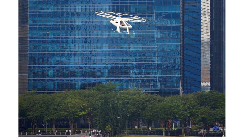 A Volocopter air taxi performs a demonstration in Singapore in October 2019 (Credit: Reuters)