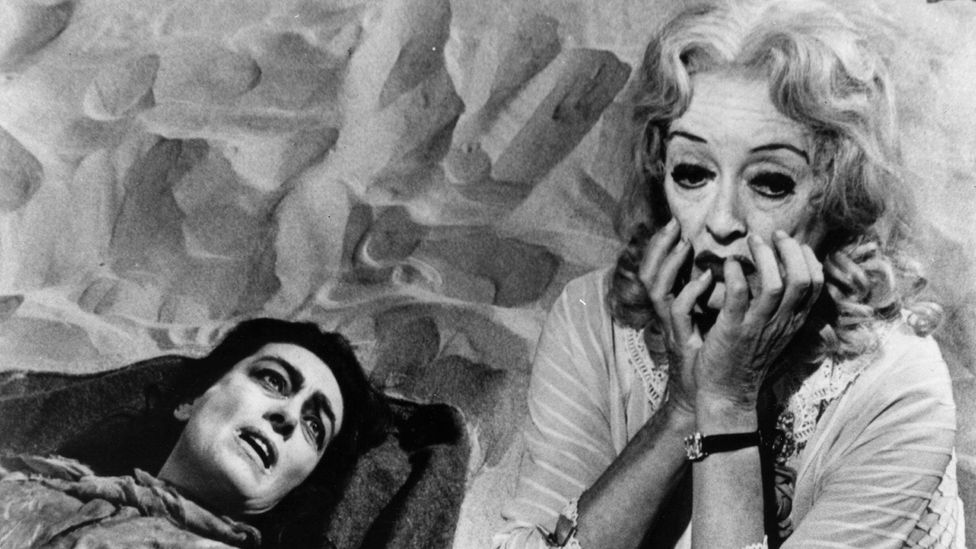 Psychological horror What Ever Happened to Baby Jane? follows an ageing actress (Davis) holding her paraplegic sister (Crawford) captive in a mansion (Credit: Getty Images)