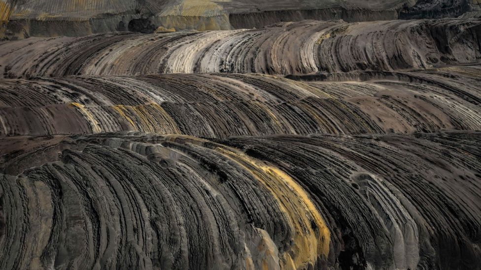 Lignite coal is a soft fossil fuel made of naturally compressed peat (Credit: Ina Fassbender/Getty Images)