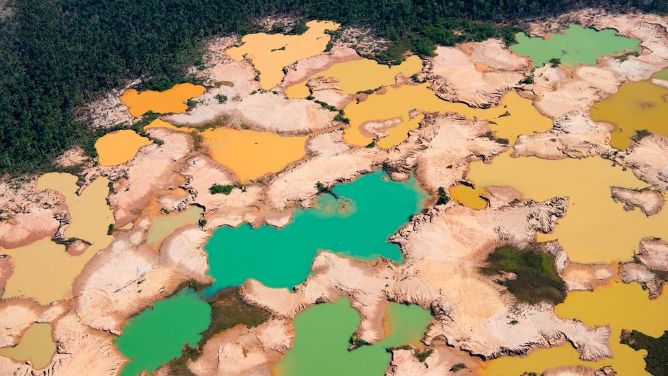 Elsewhere in the Amazon, in Peru, a deforested area caused by illegal gold mining in the river basin of the Madre de Dios (Credit: Cris Bouroncle/Getty Images)