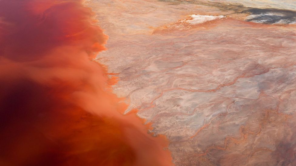 When the minerals meet air, they redden, and then darken as they collect in deeper waters (Credit: Peter Adams/Getty Images)