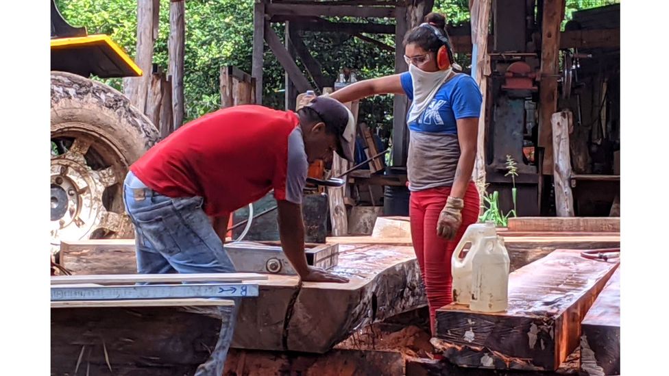 Locals such as Jamilet Espino Castillo (right) have found opportunities to learn new skills on the shipyard – such as carpentry (Credit: Jocelyn Timperley)