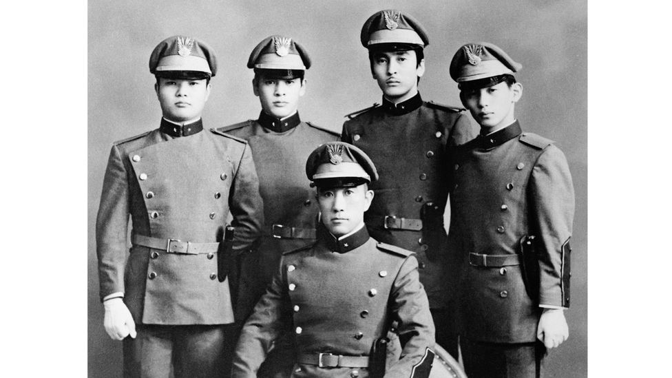 This photograph – taken a few days before his death – shows Mishima with his loyal cadets (Credit: Getty Images)