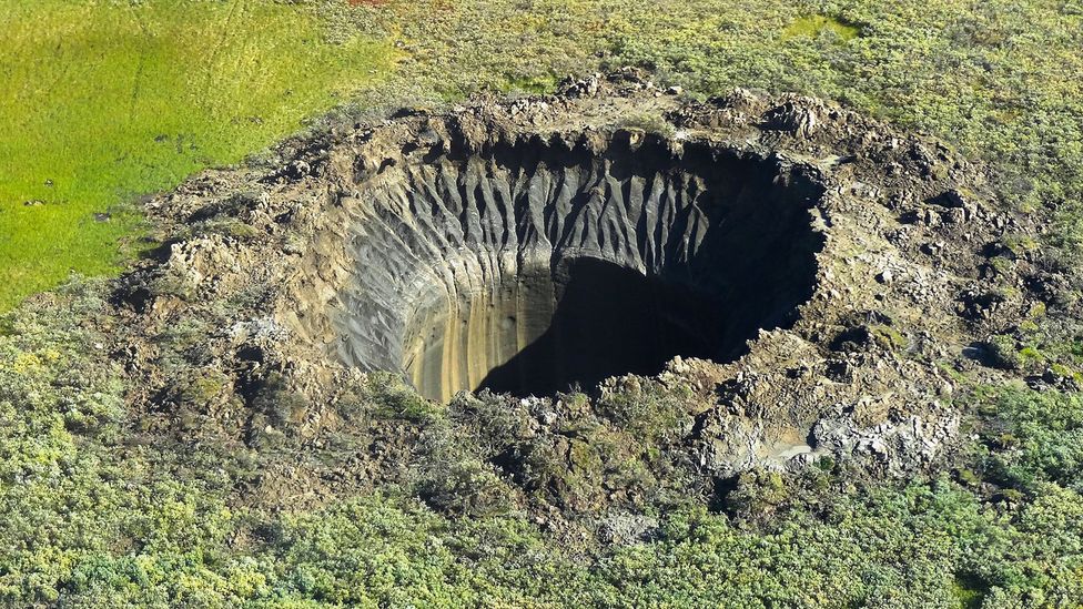 When they first appear, the craters are a spectacular sight as the explosion hurls out earth and ice to leave a deep cylindrical void (Credit: Vasily Bogoyavlensky/Getty Images)