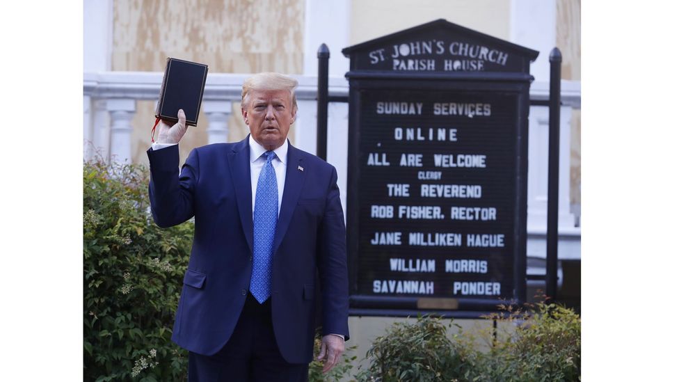 US President Donald Trump poses with a Bible outside St Johns Church in Washington DC (Credit: Shawn Thew/EPA)