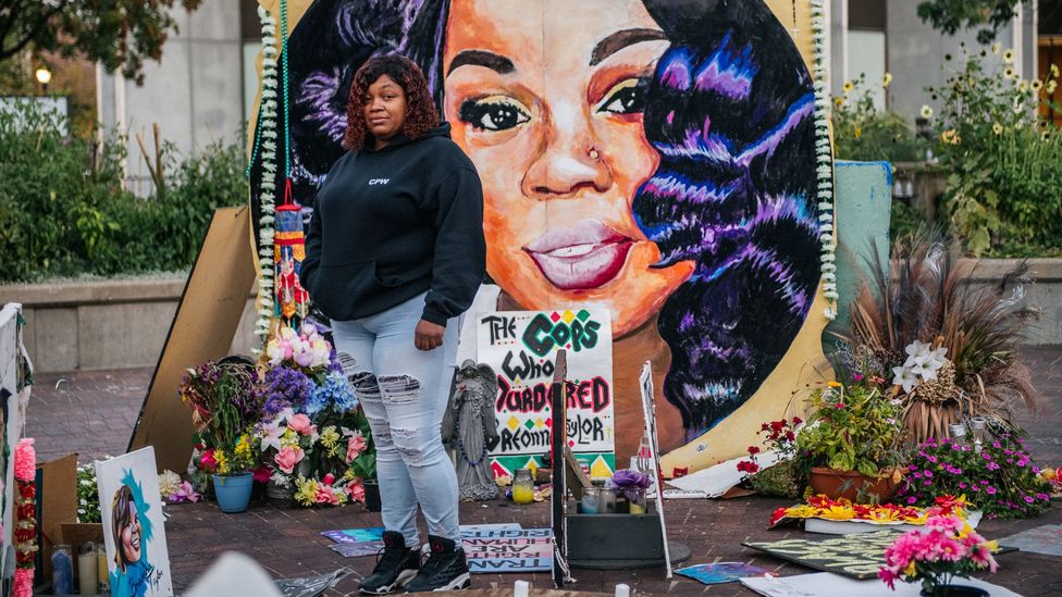 Tamika Palmer, the mother of Breonna Taylor, stands in front of a mural of her daughter in Louisville, Kentucky (Credit: Brandon Bell/ Getty Images)