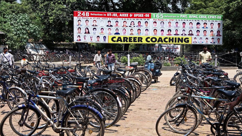 A busy coaching centre in the city of Lucknow advertises the successes of its former students (Credit: Alamy)