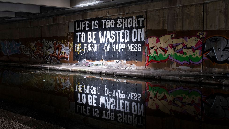 Modern society seems to be obsessed with finding happiness, but if some philosophers are to believed, this could be a fruitless pursuit (Credit: Mike Kemp/Getty Images)